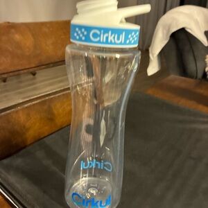 Clear Water Bottle with Blue Accents circulating